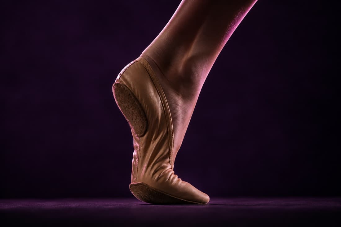 A split sole shoe bent at the arch